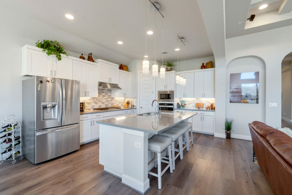 Luxury Laminate Floors in a large kitchen with an island by A & S Carpet & Flooring in Allison Park, PA.