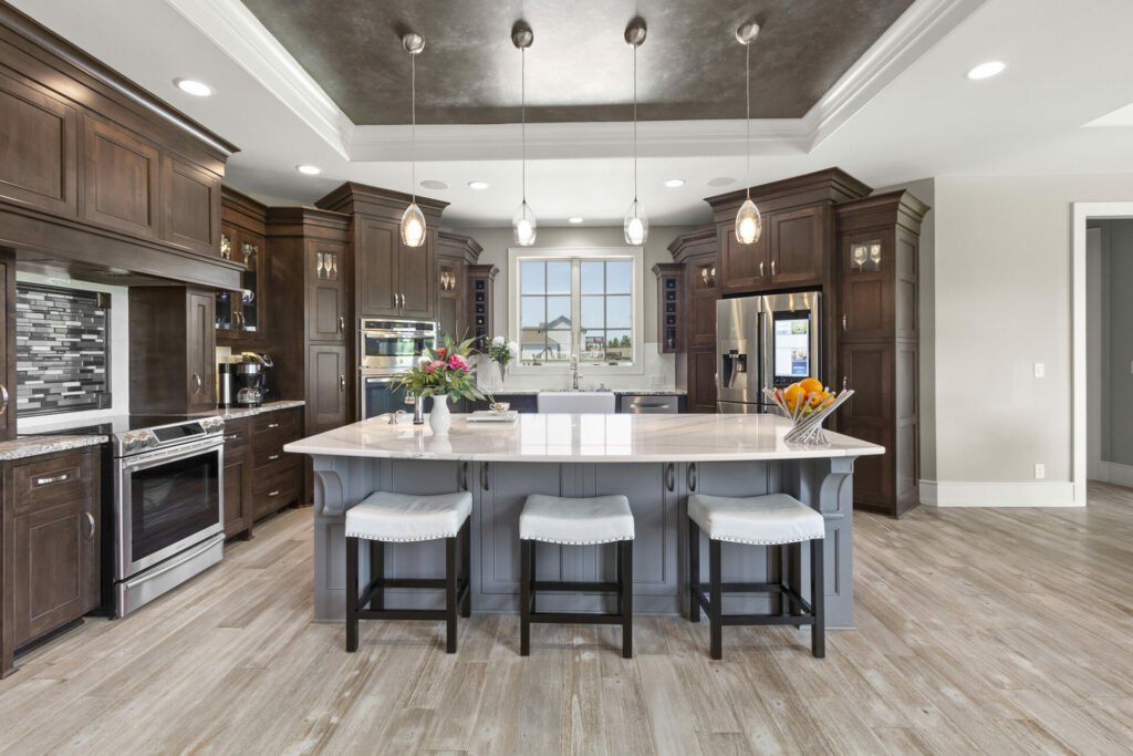 Laminate Flooring in a large kitchen with an island by A&S Carpet Collection in Allison Park, PA